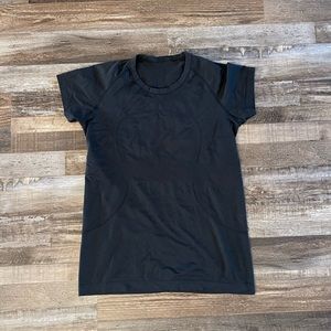 Women’s Lululemon swiftly tech short sleeve black shirt. Size 12